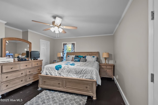 bedroom featuring ceiling fan, dark hardwood / wood-style flooring, and crown molding