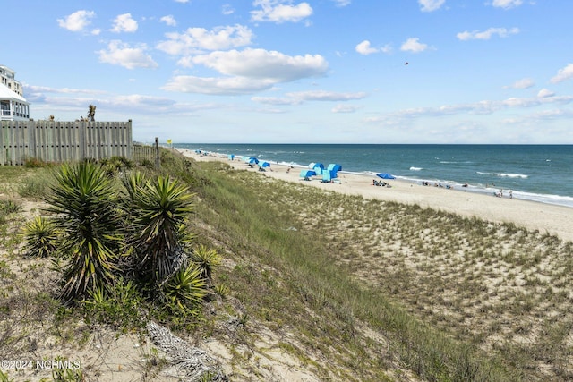 view of water feature with a beach view