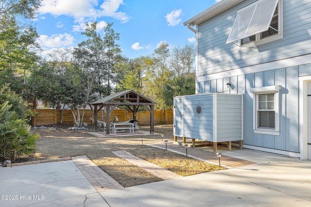 view of yard featuring a gazebo and a patio