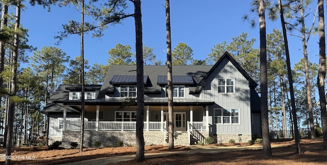 view of front of property featuring covered porch