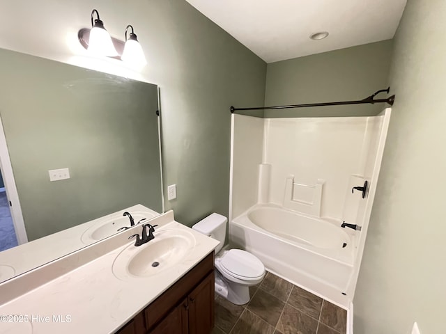 full bathroom with vanity, shower / bathtub combination, and toilet