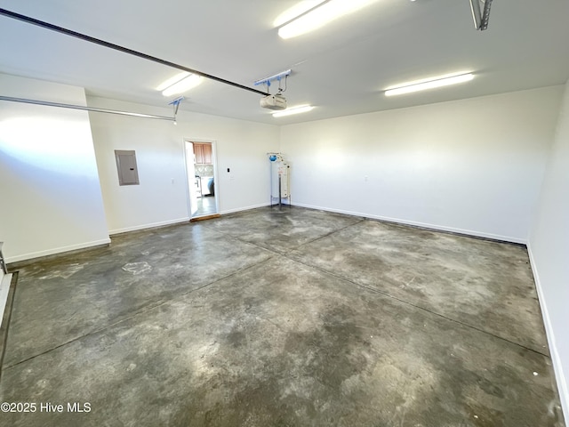 garage featuring a garage door opener and electric panel