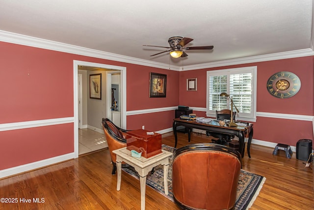 office space with hardwood / wood-style floors and crown molding