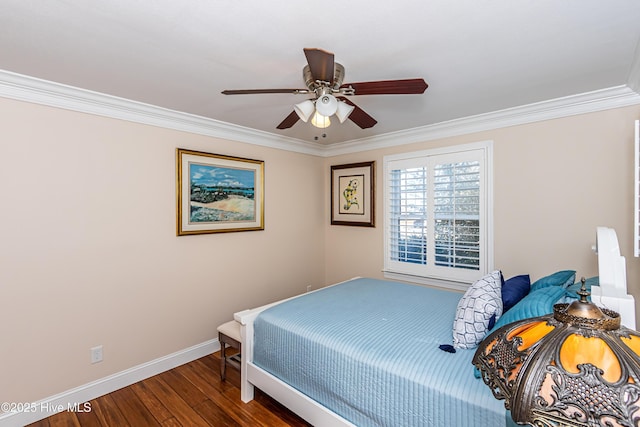 bedroom featuring ceiling fan, dark hardwood / wood-style flooring, and ornamental molding