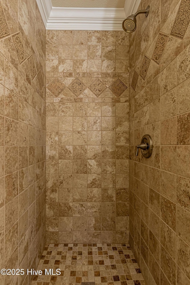 bathroom featuring a tile shower