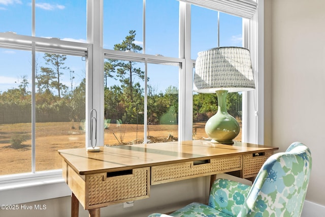 sunroom featuring plenty of natural light