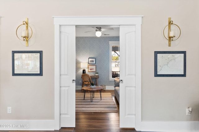 corridor featuring dark hardwood / wood-style flooring