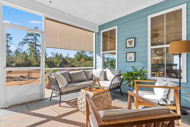 sunroom / solarium featuring plenty of natural light