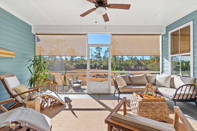 sunroom / solarium with ceiling fan