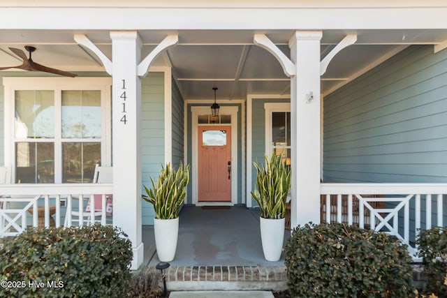 entrance to property featuring ceiling fan