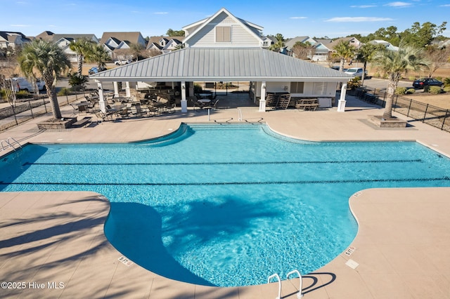 view of swimming pool with a gazebo and a patio