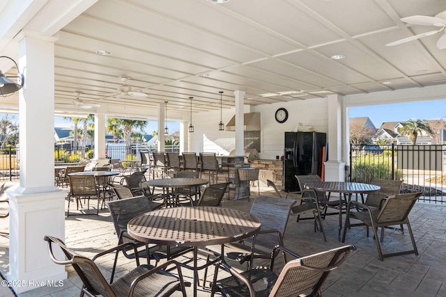 view of patio / terrace with ceiling fan