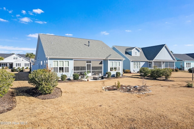 back of property featuring a patio area