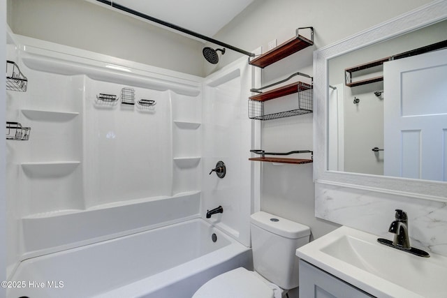 full bathroom featuring vanity, tub / shower combination, and toilet