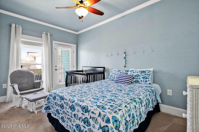 carpeted bedroom with ceiling fan and crown molding