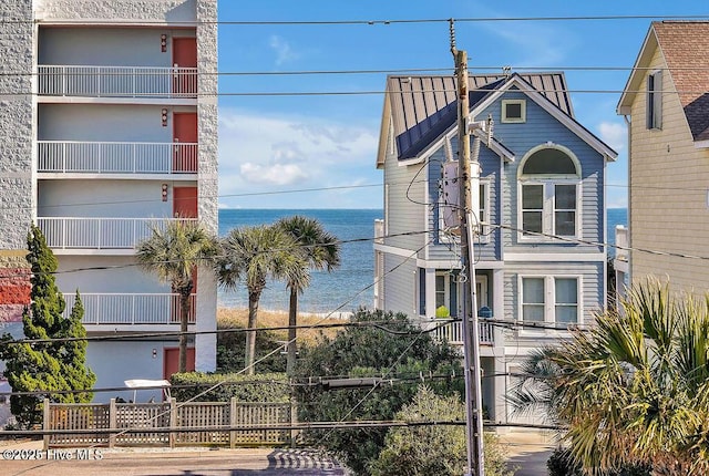 exterior space with a water view