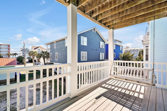 wooden deck featuring covered porch