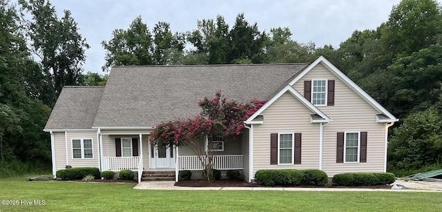 view of front of house featuring a porch and a front yard