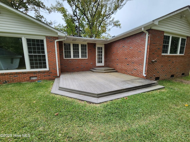 wooden deck with a yard