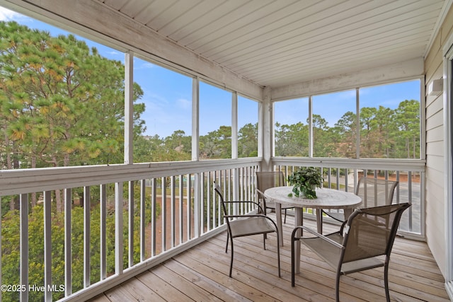 unfurnished sunroom featuring a healthy amount of sunlight