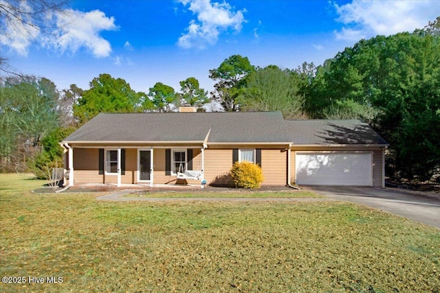 ranch-style home featuring a porch, a garage, and a front yard