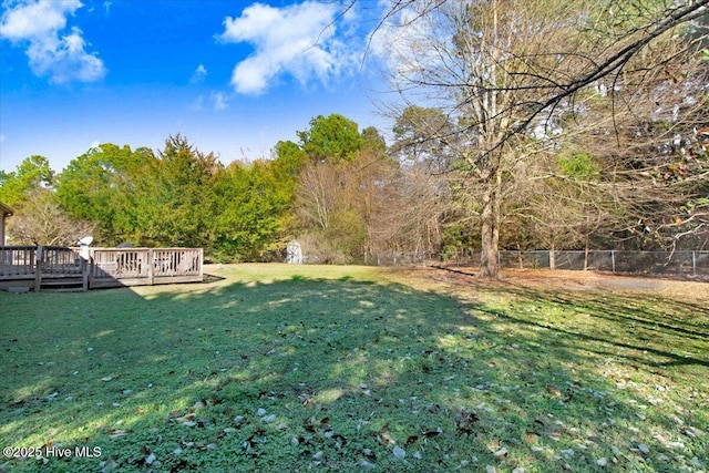 view of yard featuring a deck