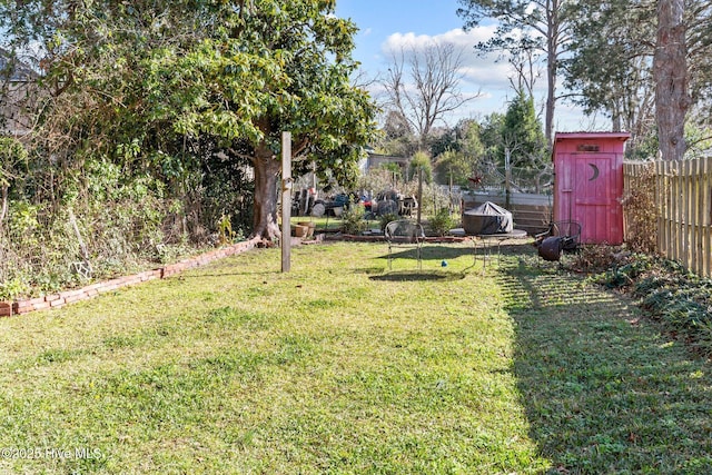 view of yard with a shed