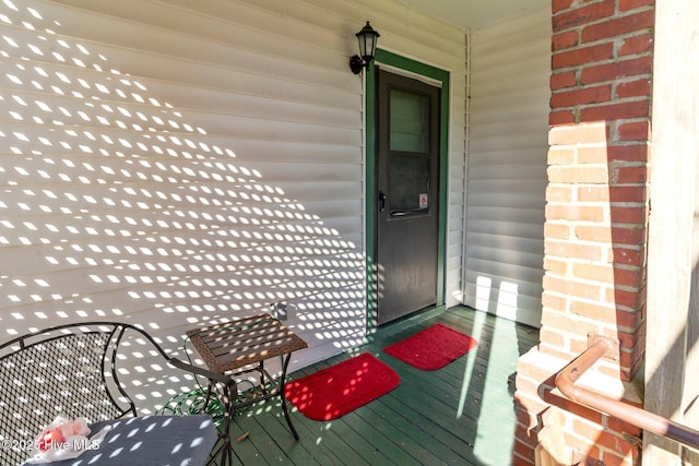 property entrance with a porch