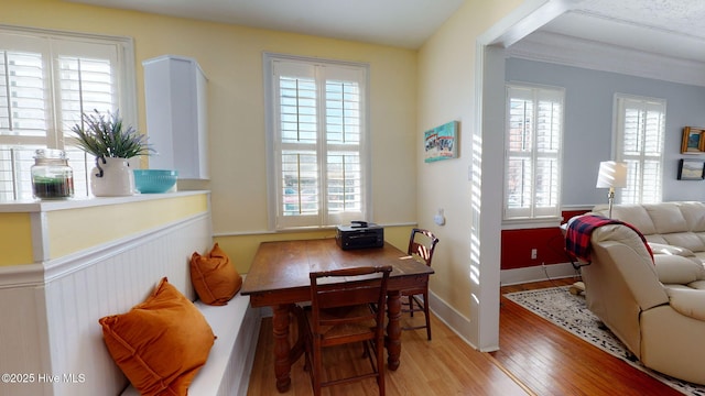 dining area with light hardwood / wood-style flooring