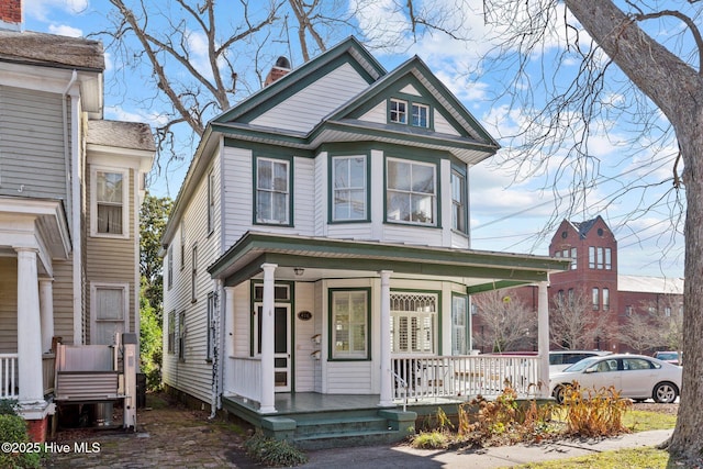 victorian home featuring a porch