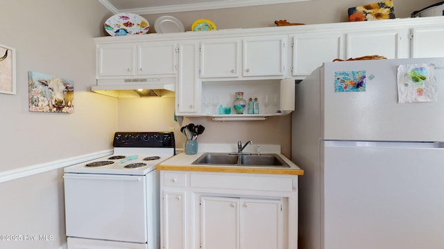 kitchen featuring crown molding, sink, white cabinets, and white appliances