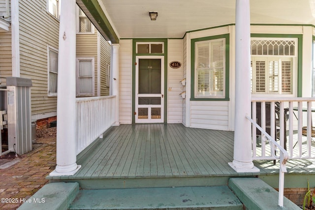 entrance to property with a porch