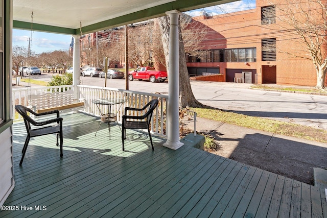 wooden deck with a porch