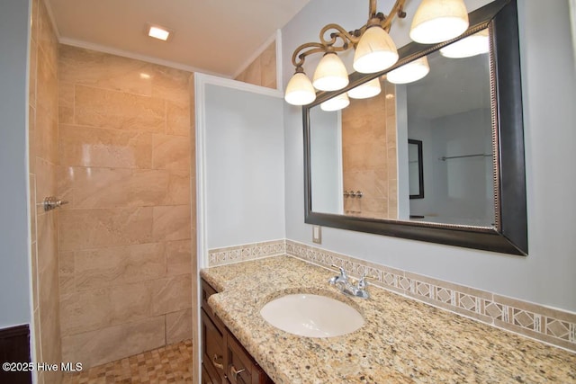 bathroom with vanity and crown molding