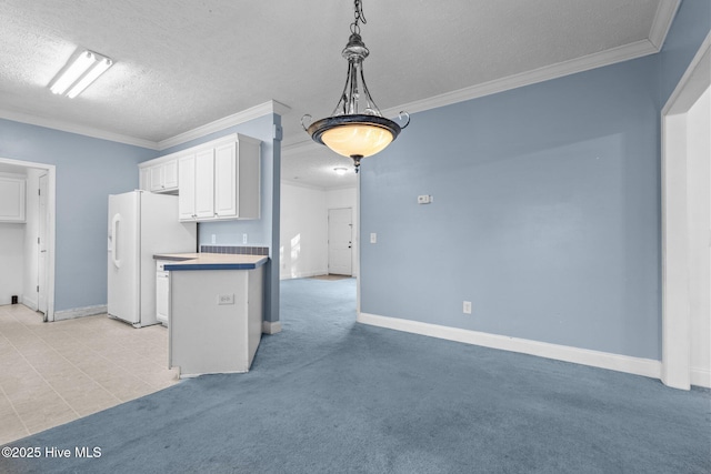 kitchen with white cabinets, pendant lighting, a textured ceiling, and white refrigerator with ice dispenser