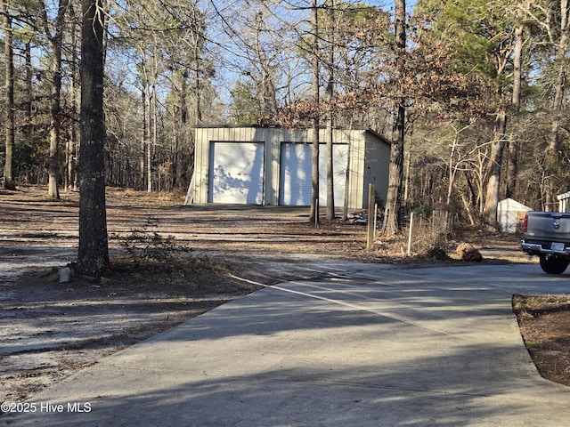 view of outdoor structure with a garage