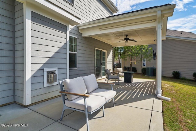 view of patio / terrace with ceiling fan, central AC unit, and an outdoor living space