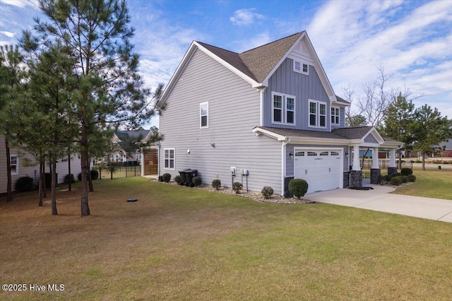 view of home's exterior featuring a lawn and a garage