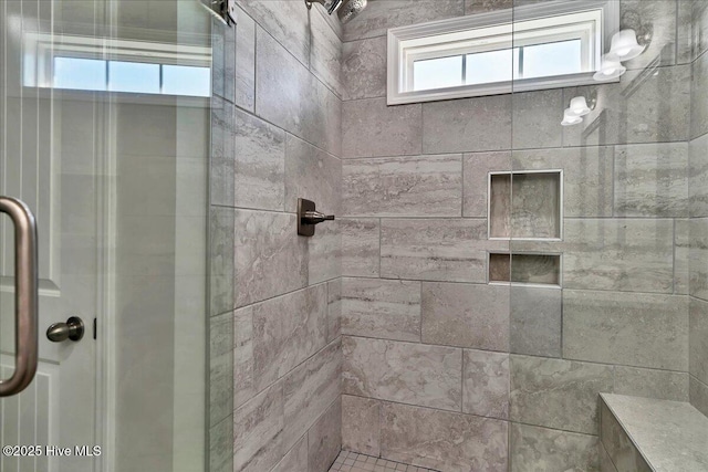 bathroom featuring an enclosed shower