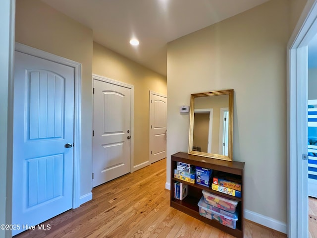 corridor featuring light hardwood / wood-style flooring