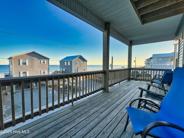 deck at dusk with a water view