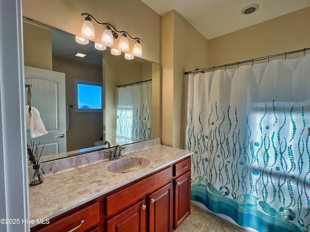 bathroom featuring vanity and tile patterned flooring