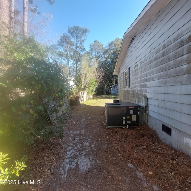 view of yard with cooling unit