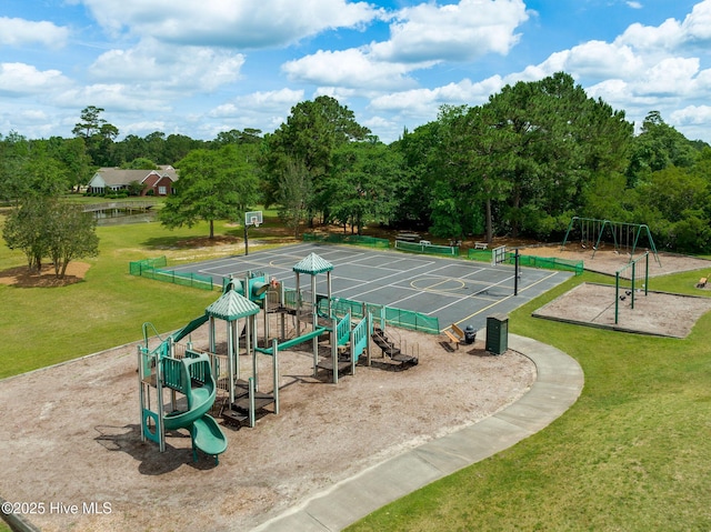 surrounding community featuring a playground and a yard