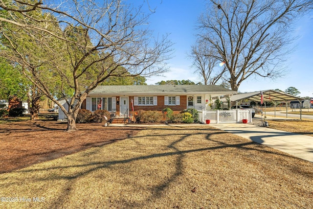 view of front of property featuring a carport