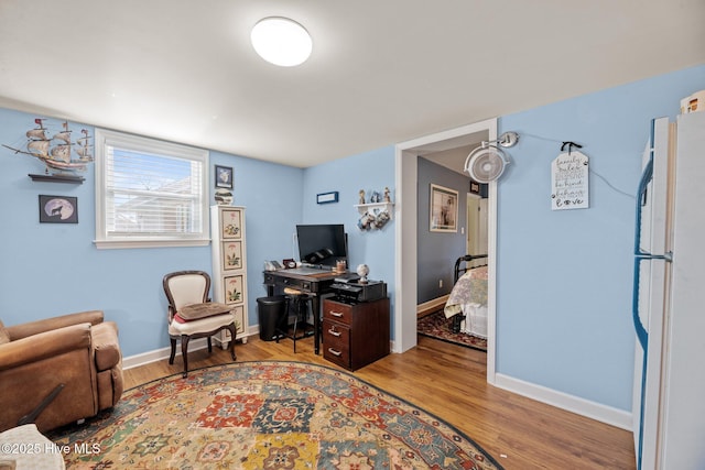 office space featuring light wood-type flooring