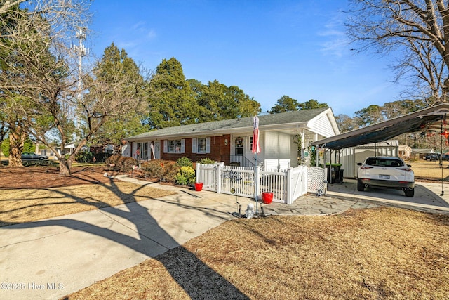 ranch-style house with a carport