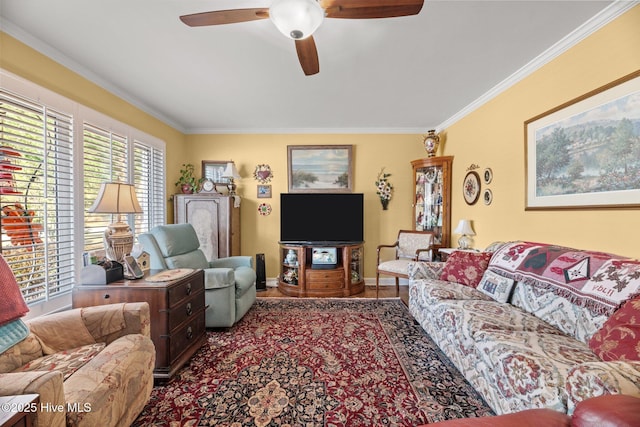 living room with crown molding and ceiling fan