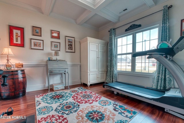 interior space featuring crown molding, dark hardwood / wood-style floors, and coffered ceiling