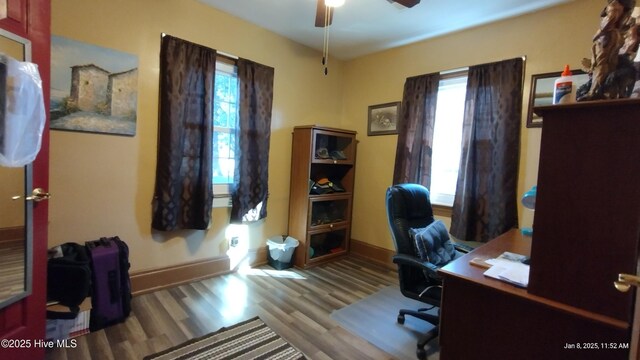 misc room featuring light carpet and ceiling fan